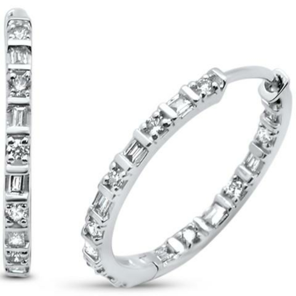.81ct 14kt white gold Baguette and round diamond